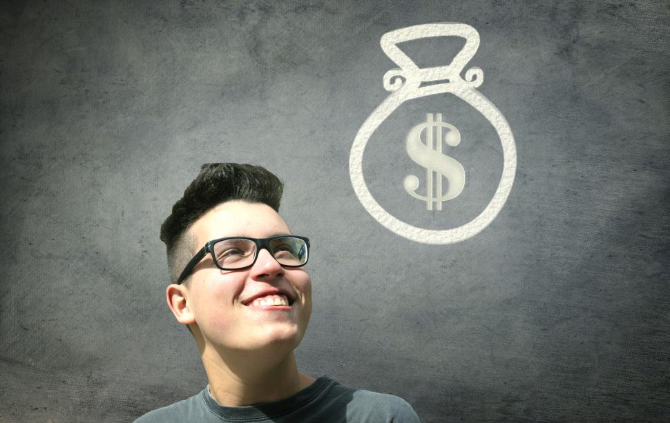 m_Prize_Winner_-_Young_Man_Smiling_with_Bag_of_Money